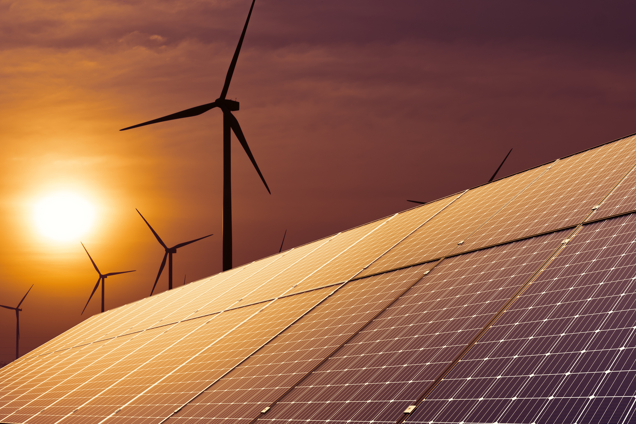 Wind turbines at sunset — renewable energy future